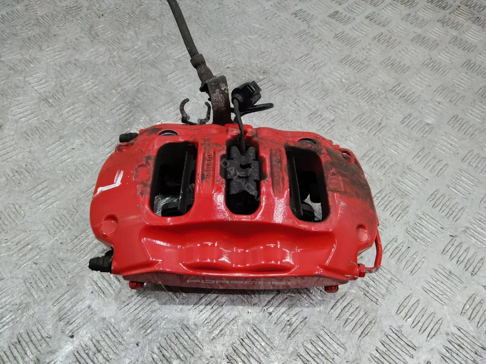Суппорт тормозной 97035205511