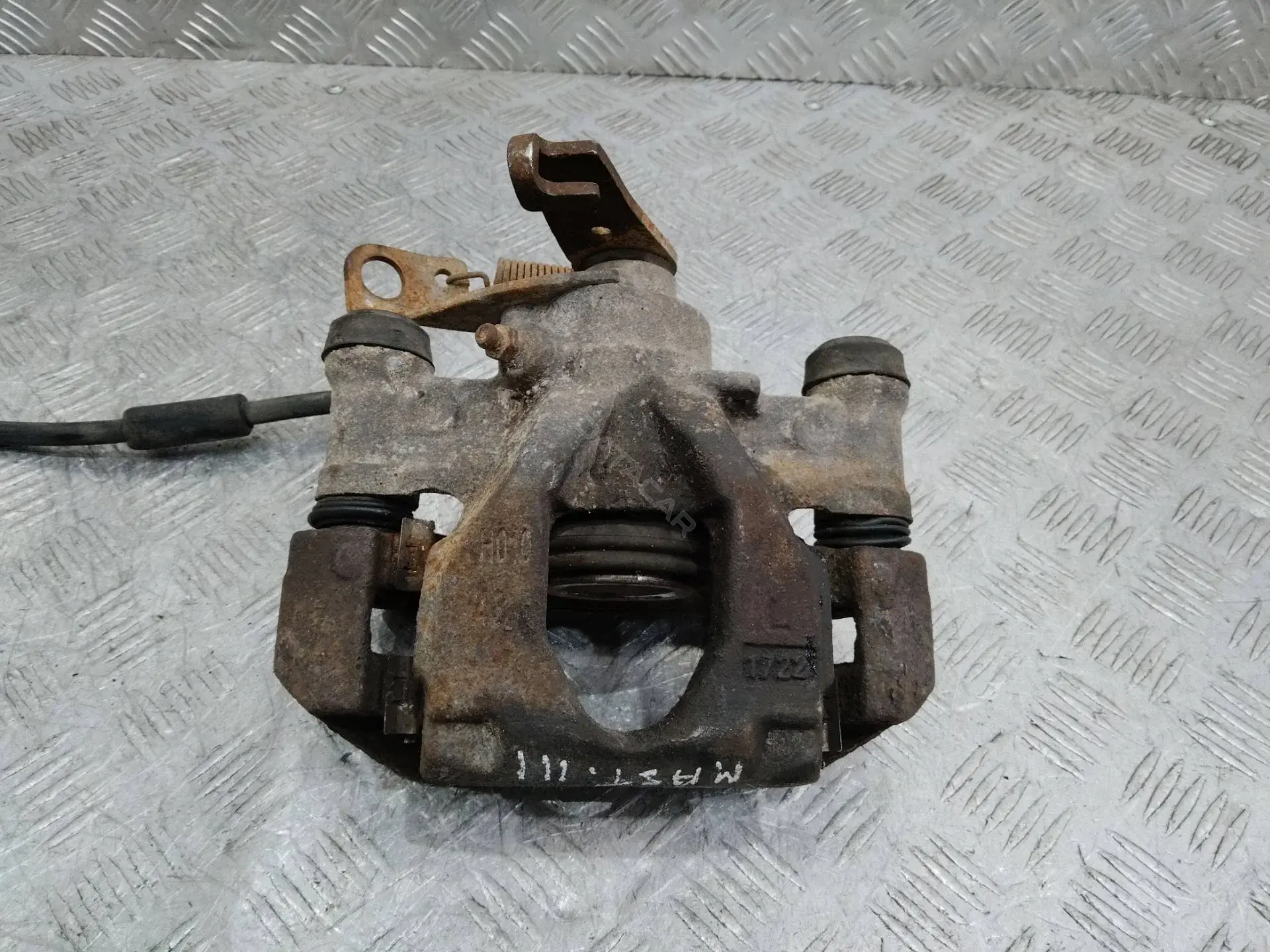 Суппорт тормозной 7913964