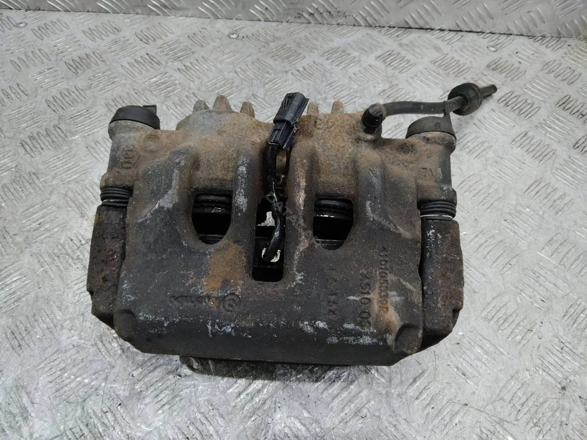 Суппорт тормозной 410105039R