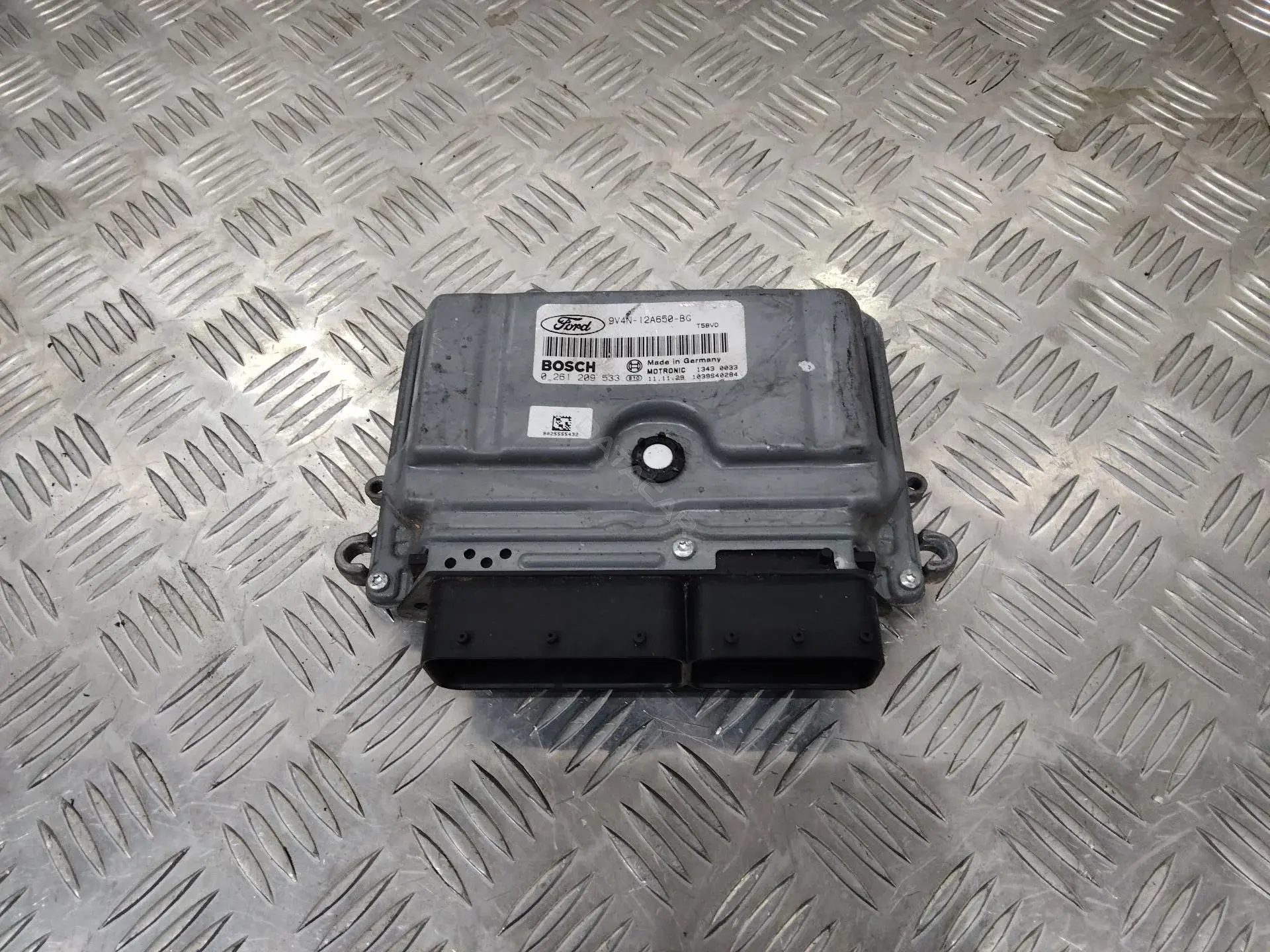 Блок управления двигателем 9V4N12A650BG