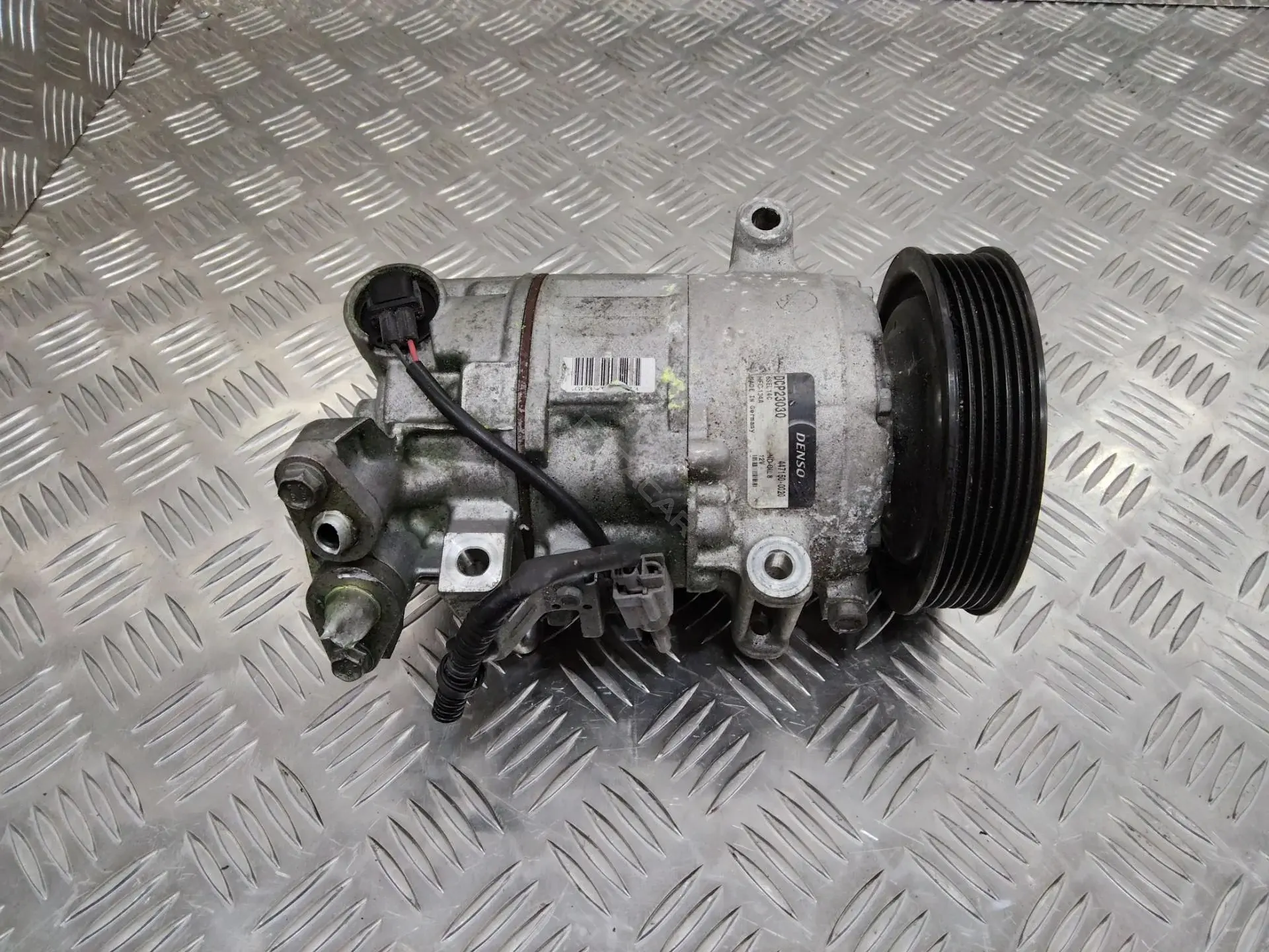 Компрессор кондиционера DCP23030