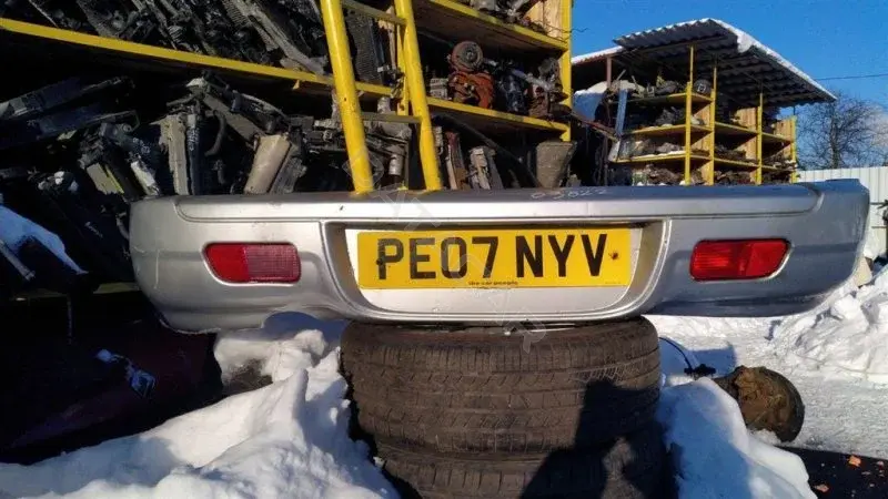 Задний бампер ZG97TZZAC