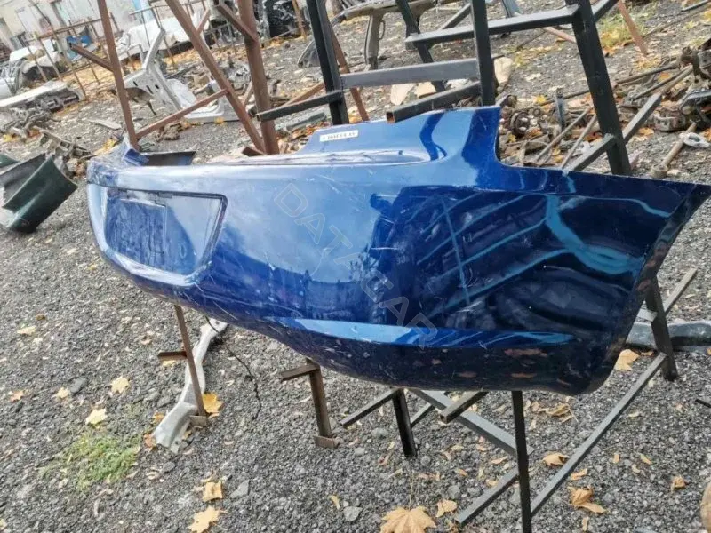Задний бампер 67143