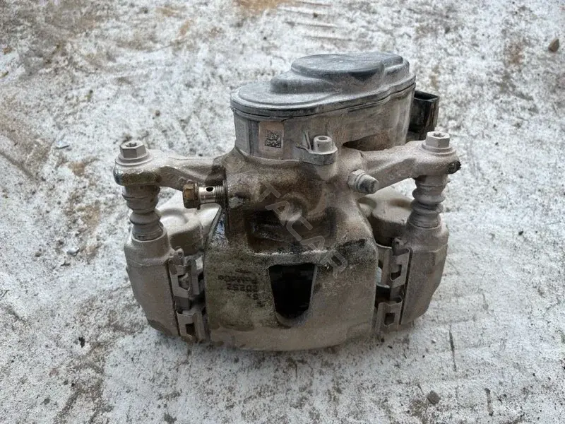 Суппорт тормозной JL3Z2553A