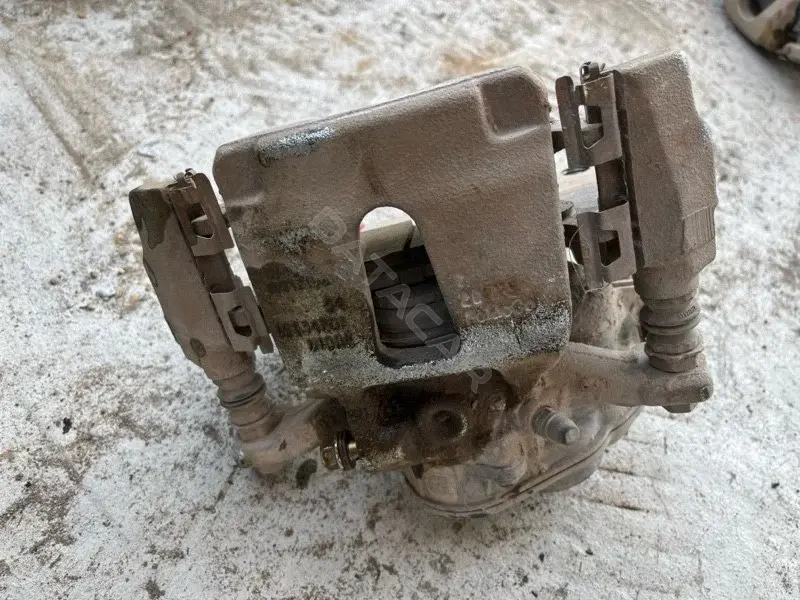 Суппорт тормозной JL3Z2552A