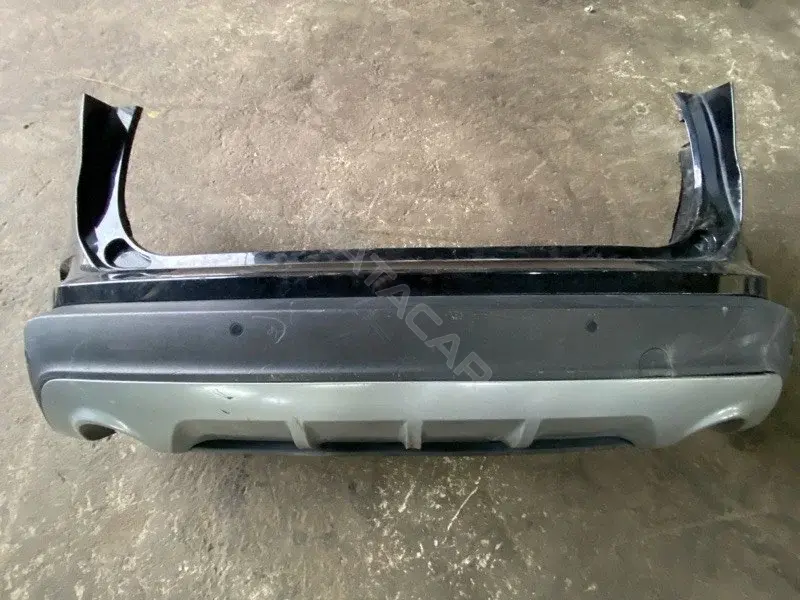 Задний бампер KT4Z17K835
