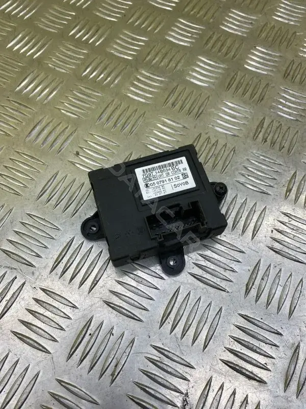 Блок управления двери 7G9T14B534BC