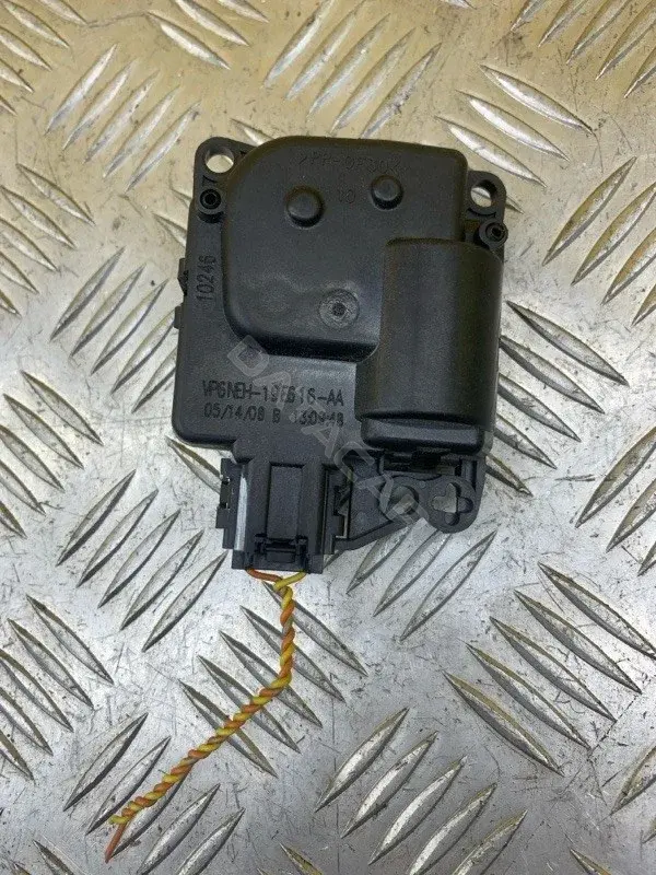 Мотор заслонки печки VP6NEH19E616AA