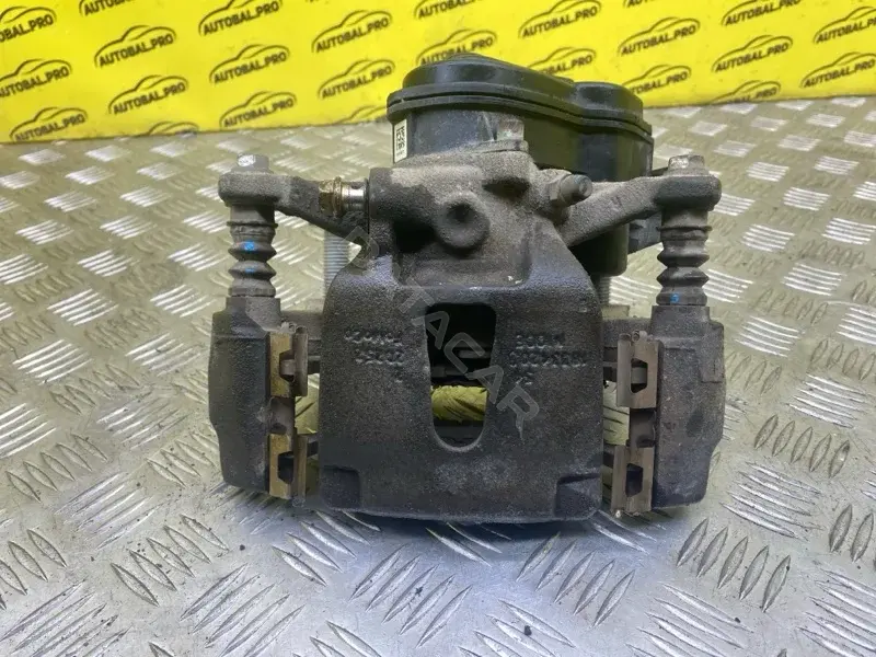 Суппорт тормозной JL3Z2552A