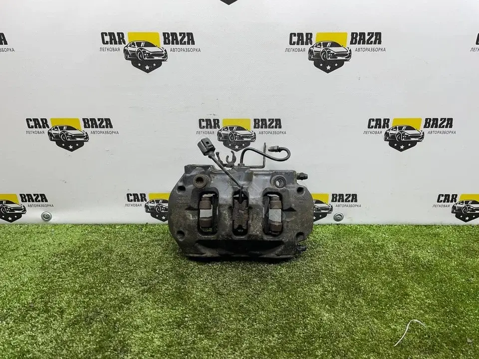 Суппорт тормозной 7P0615423