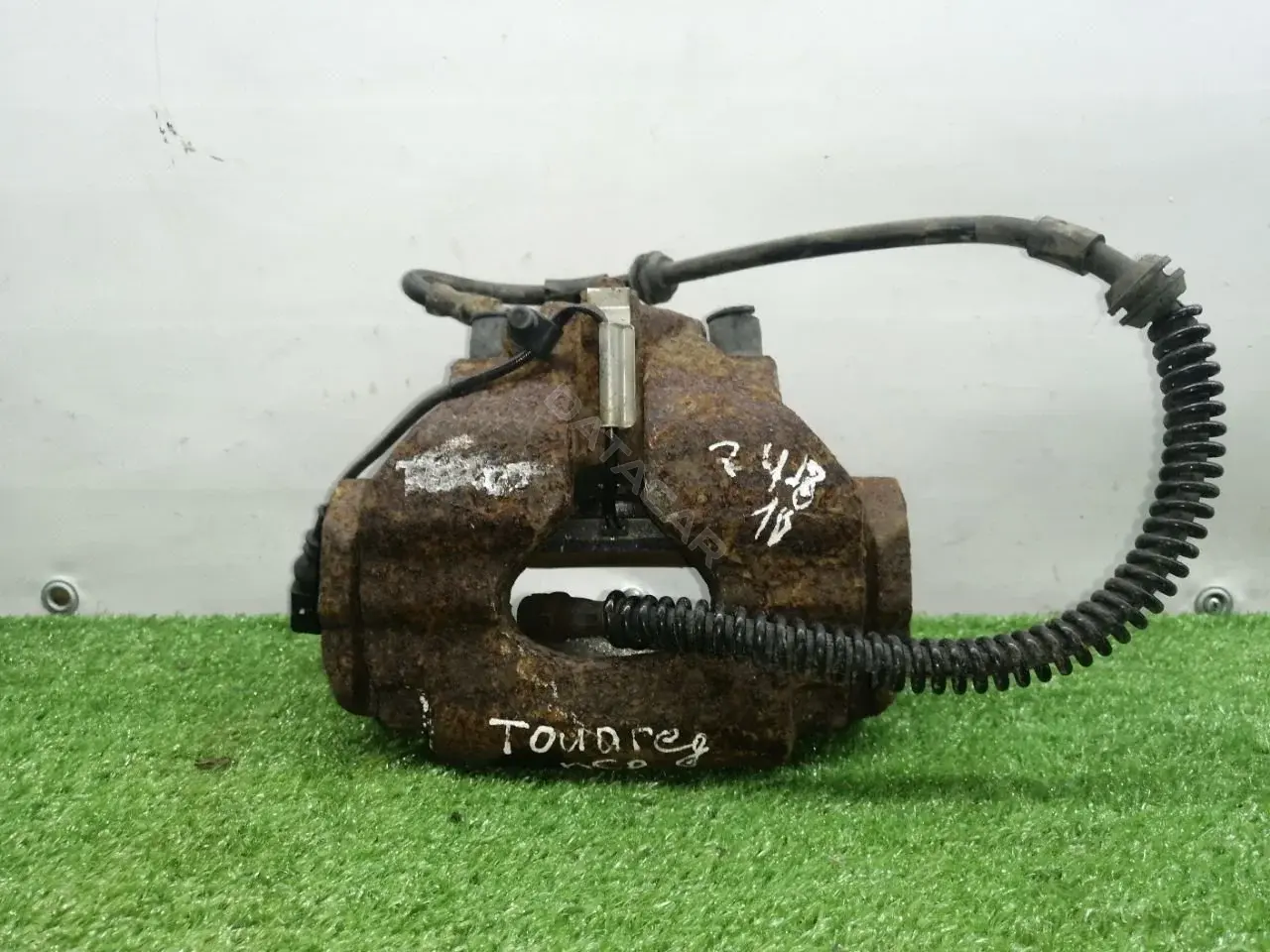 Суппорт тормозной 7L6106D