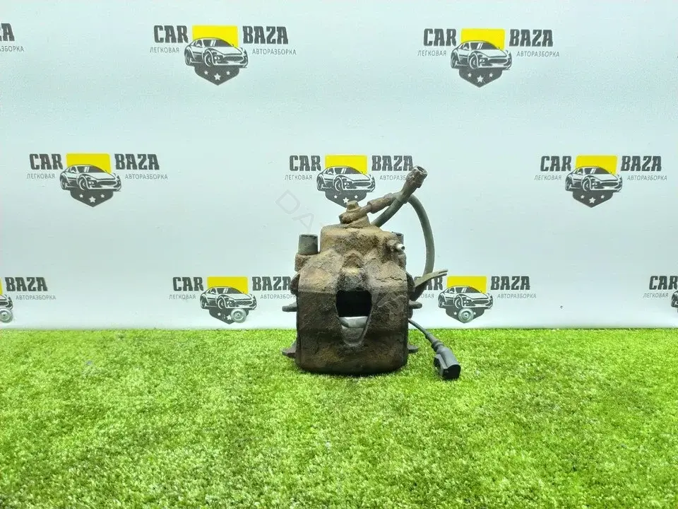 Суппорт тормозной 1K0615123D