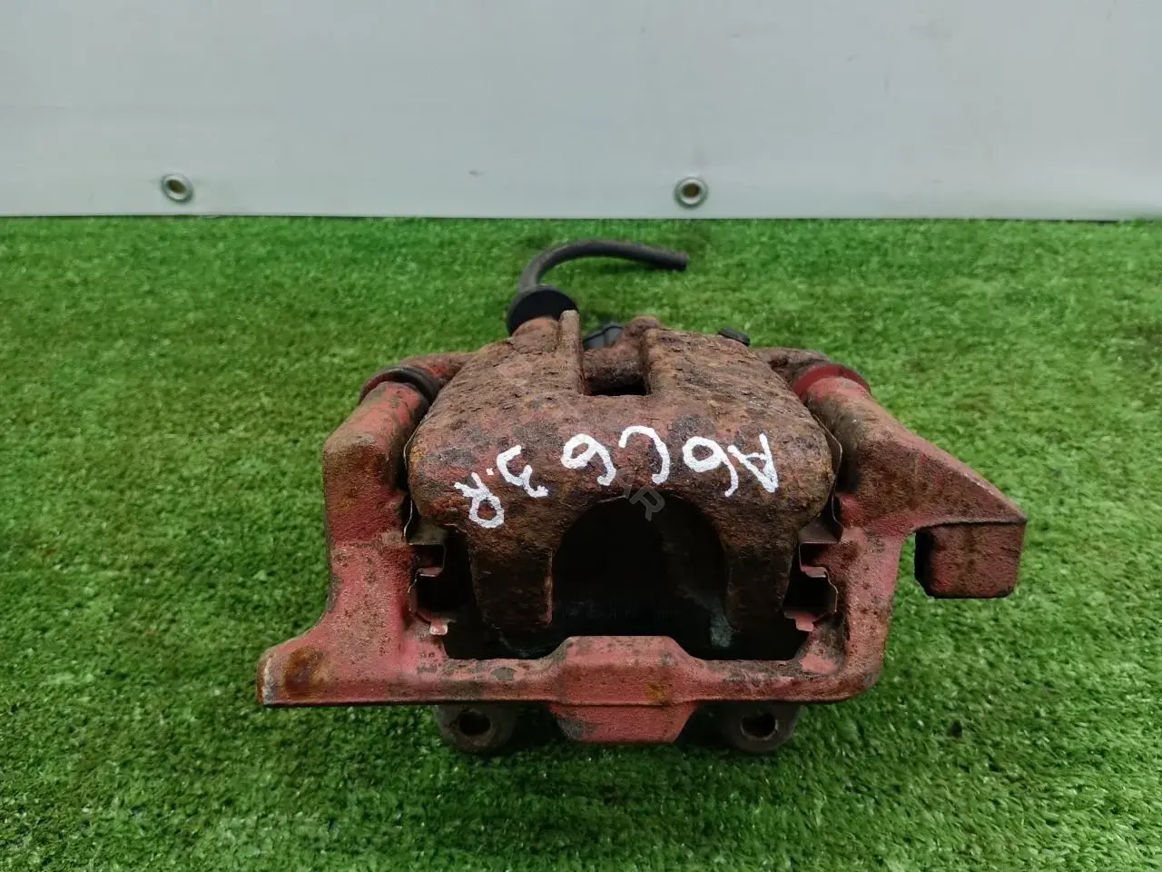 Суппорт тормозной 4F0615404F