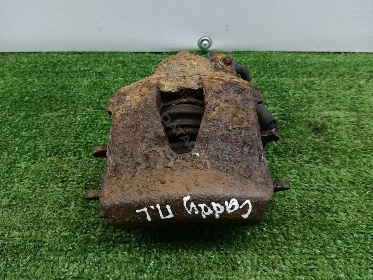 Суппорт тормозной 1K0615124E