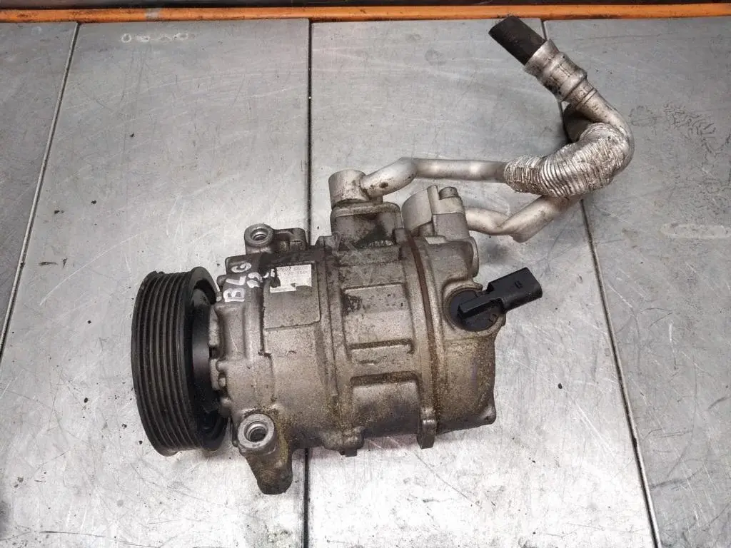 Компрессор кондиционера 1K0820859C