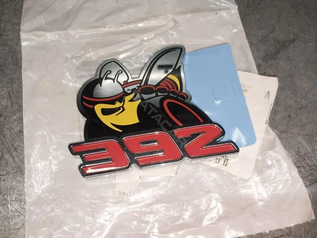Эмблема 68394690AA