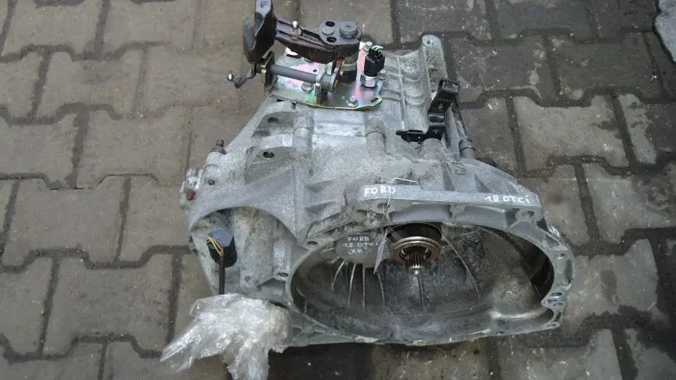 Механическая коробка передач (МКПП) XS4R-7F096CB