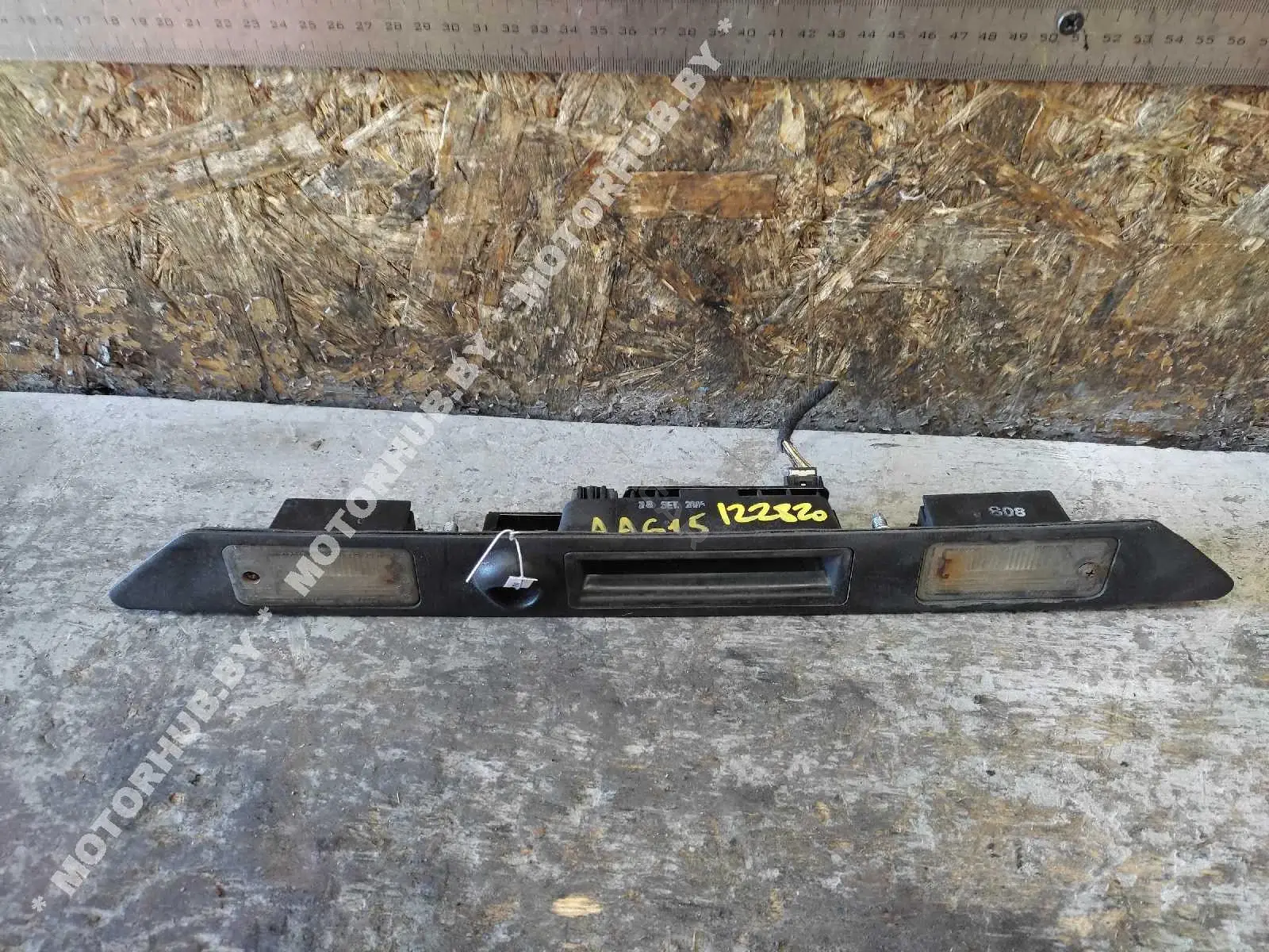Фонарь подсветки номерного знака 8E0827574C