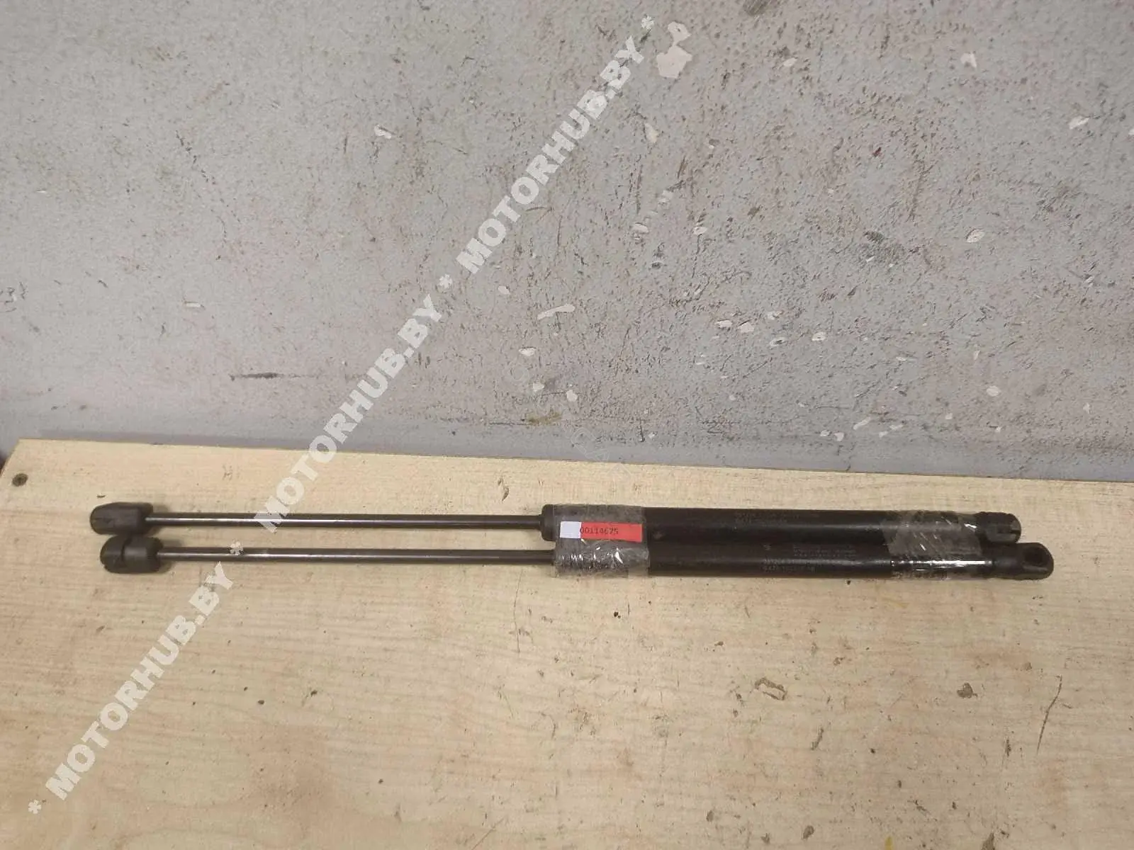Амортизатор крышки багажника, капота, заднего стекла GX7316C826AB