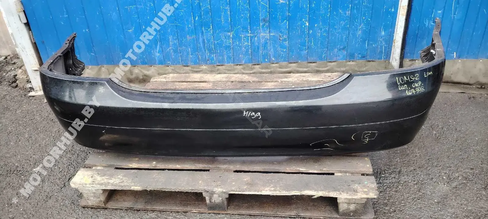 Задний бампер 00107998