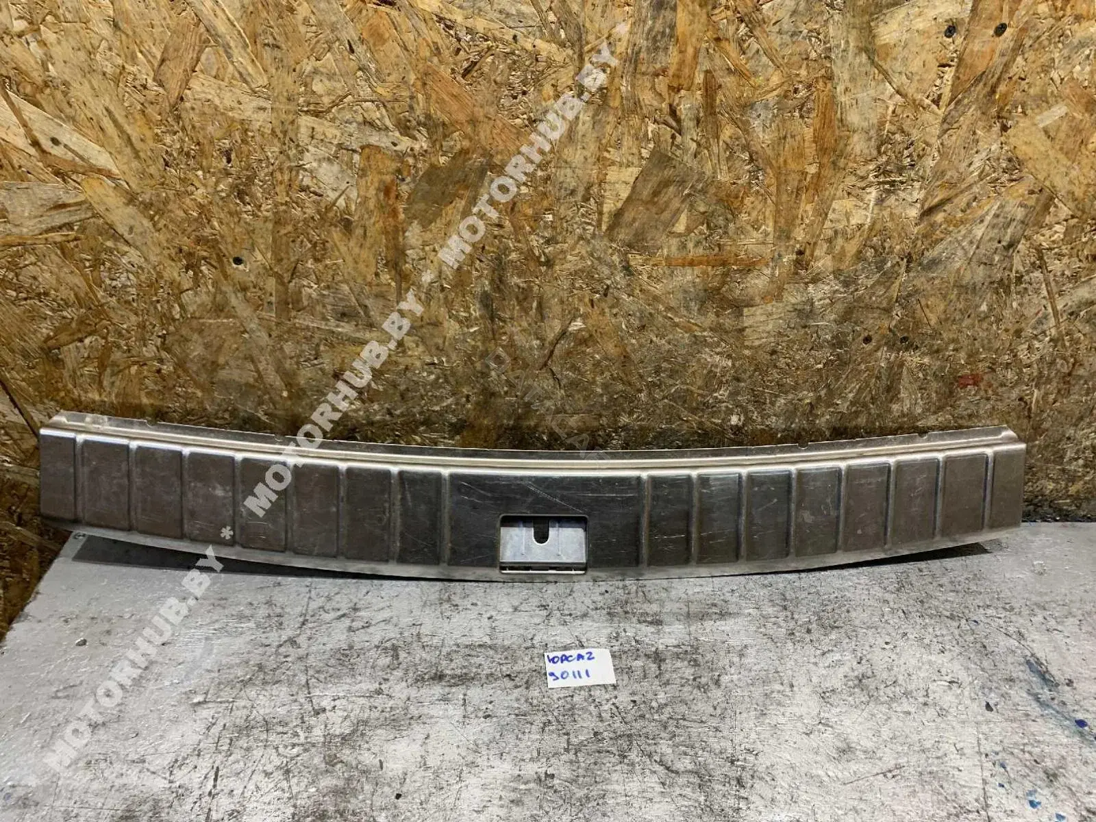 Обшивка багажника 00090111