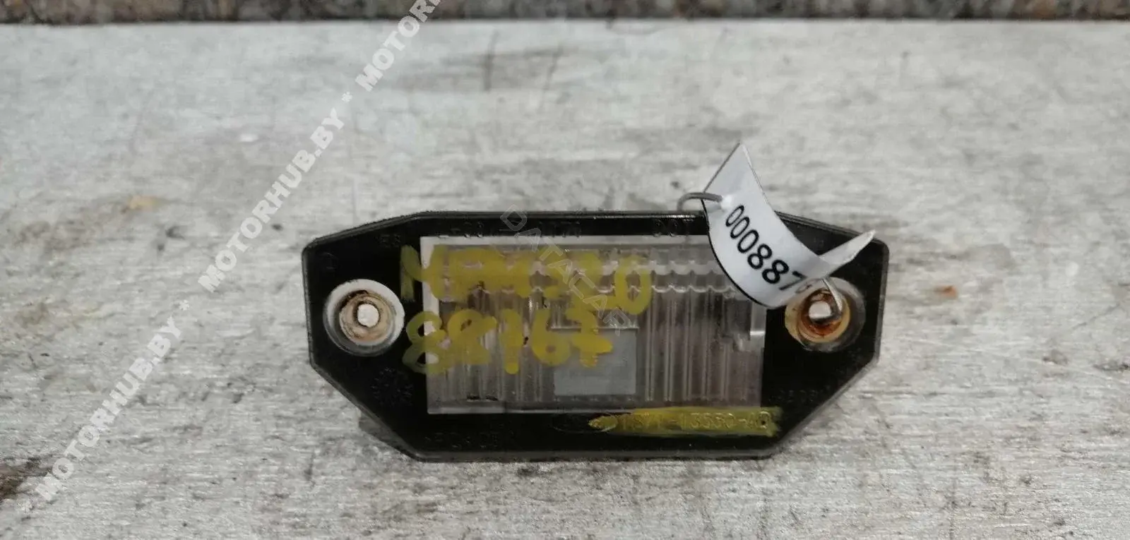 Фонарь подсветки номерного знака 1S7113550AD