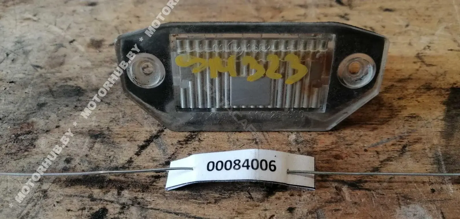 Фонарь подсветки номерного знака 1S7113550AD