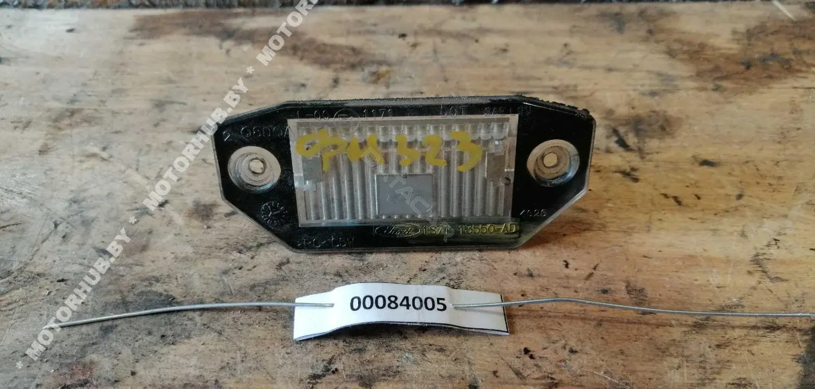 Фонарь подсветки номерного знака 1S7113550AD