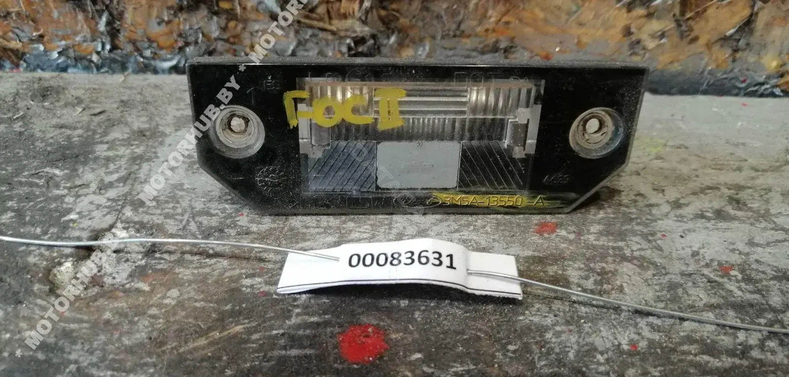 Фонарь подсветки номерного знака 3M5A13550A