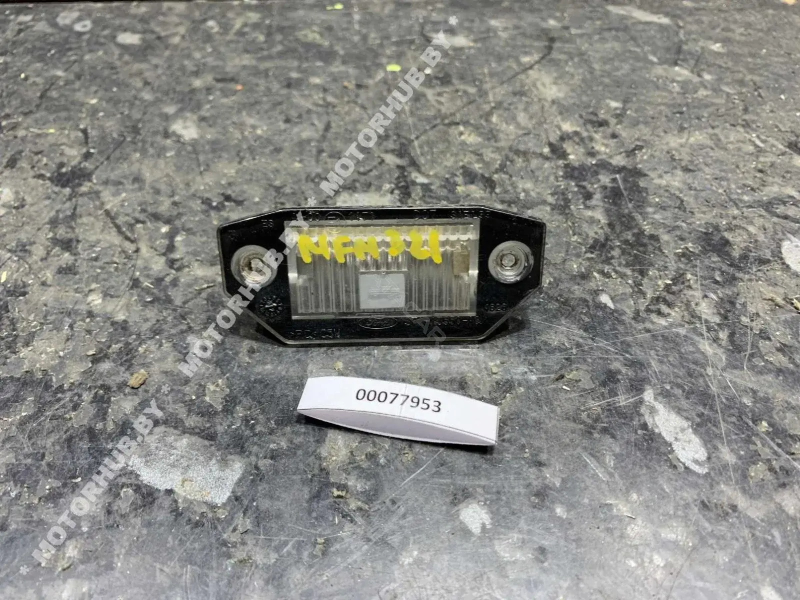 Фонарь подсветки номерного знака 1S7113550AC