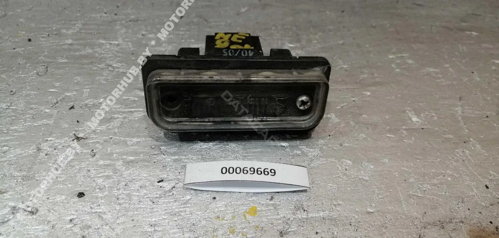 Фонарь подсветки номерного знака A2038200256
