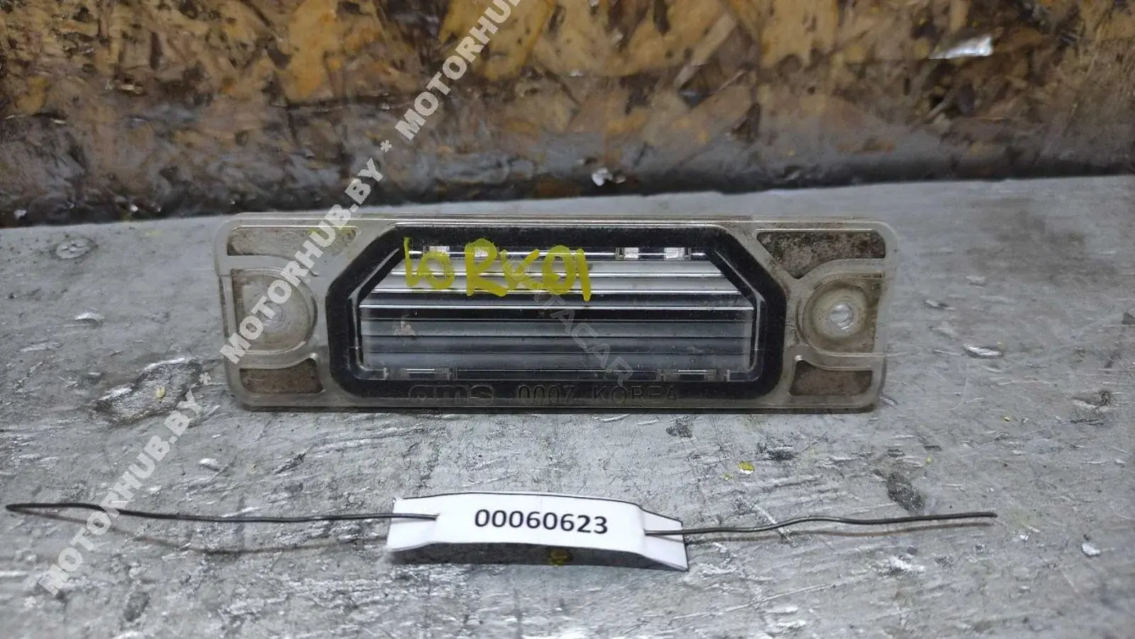 Фонарь подсветки номерного знака 26510JY00A
