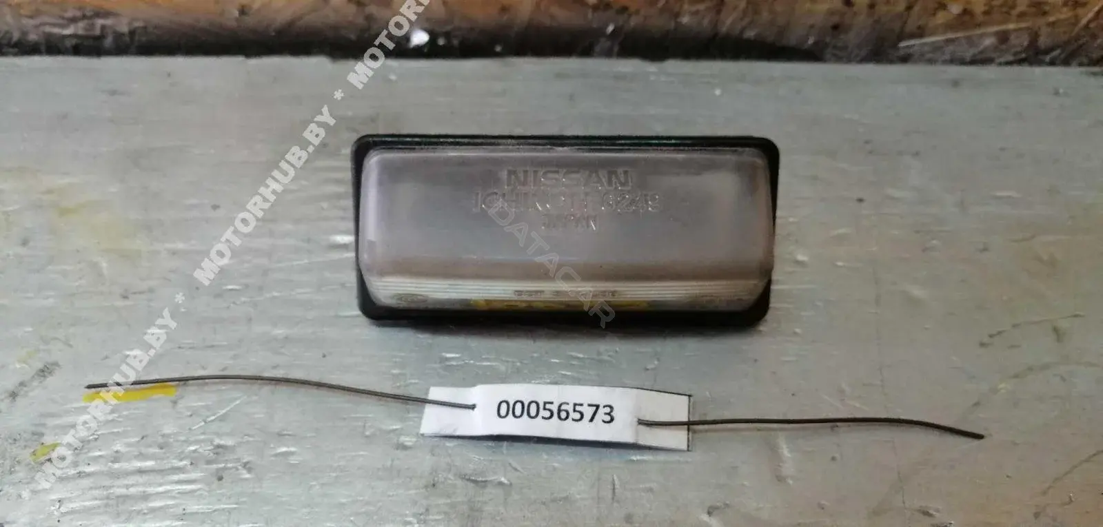 Фонарь подсветки номерного знака 00056573