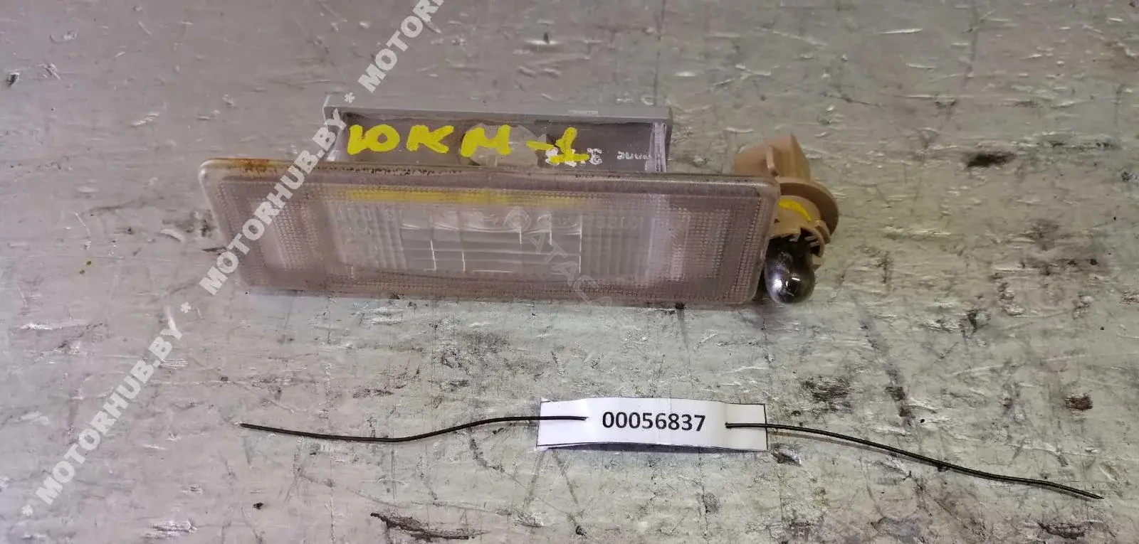Фонарь подсветки номерного знака 925012G000
