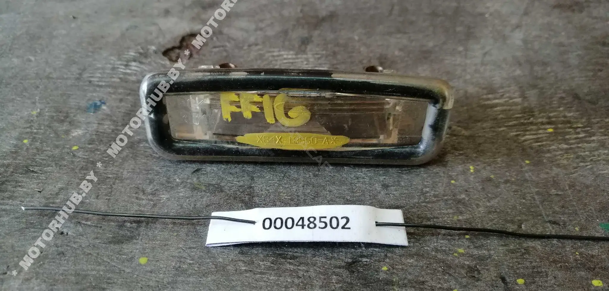Фонарь подсветки номерного знака XS4X13550A