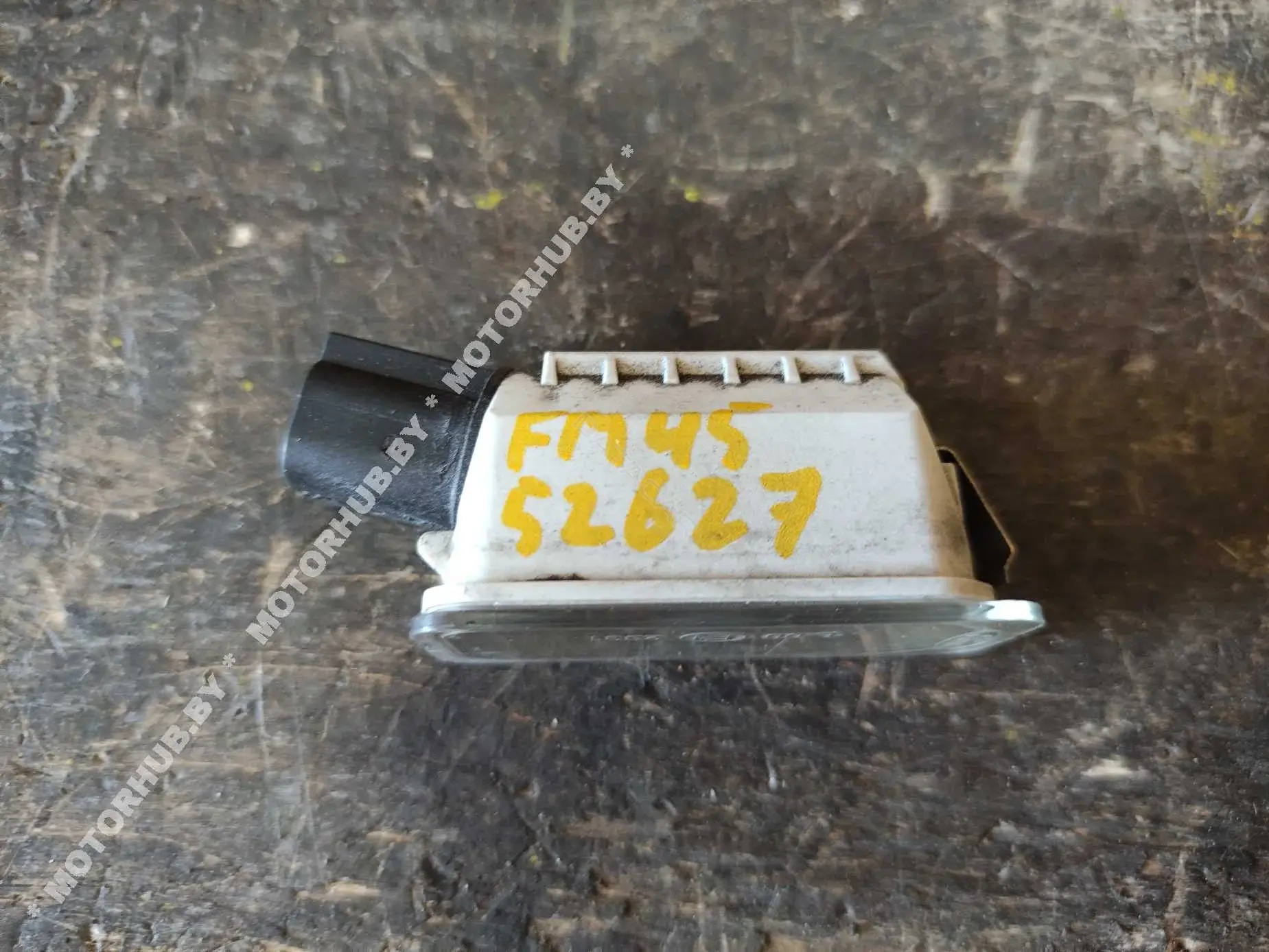 Фонарь подсветки номерного знака 7S7113550AB
