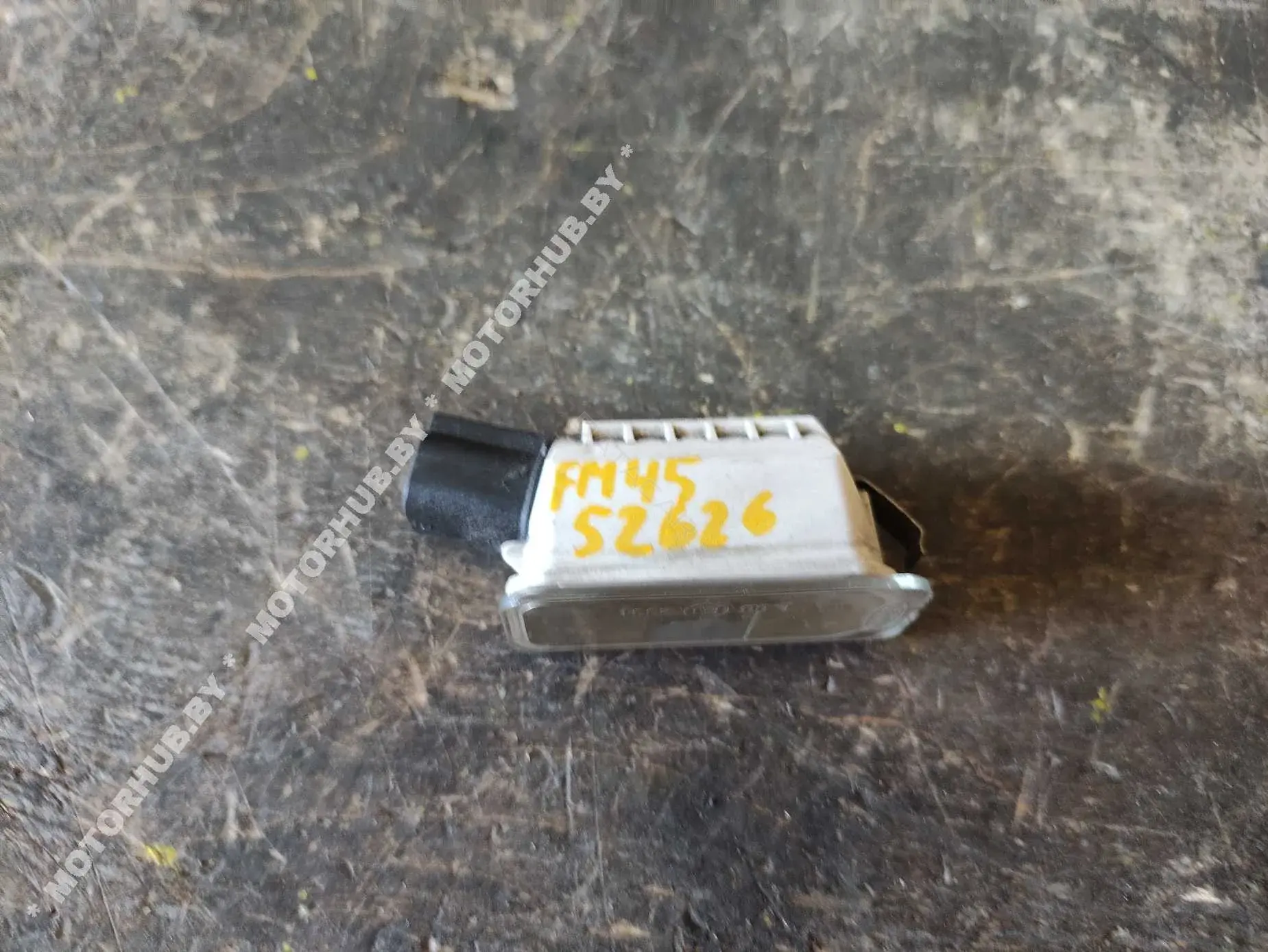 Фонарь подсветки номерного знака 7S7113550AB