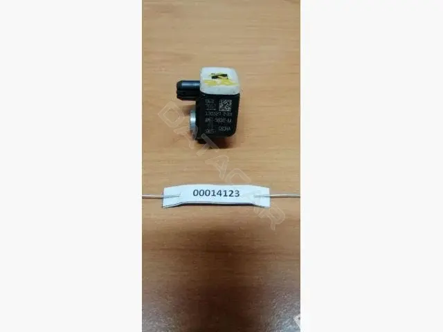 Датчик удара AM5T14B342AA
