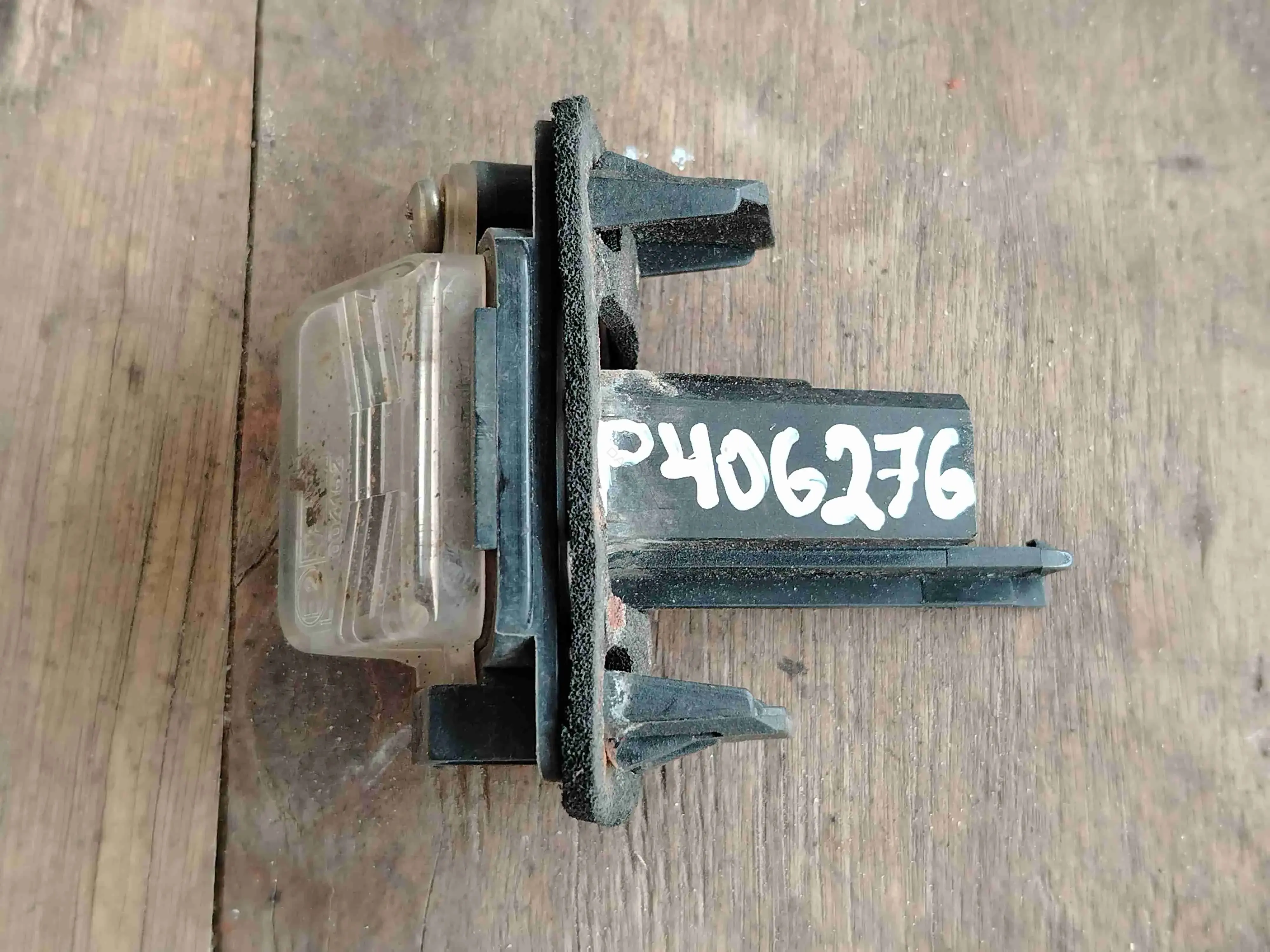 Фонарь подсветки номерного знака P406276