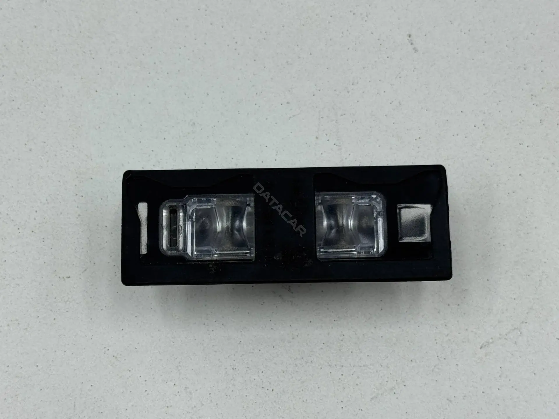 Фонарь подсветки номерного знака 8W6943021A