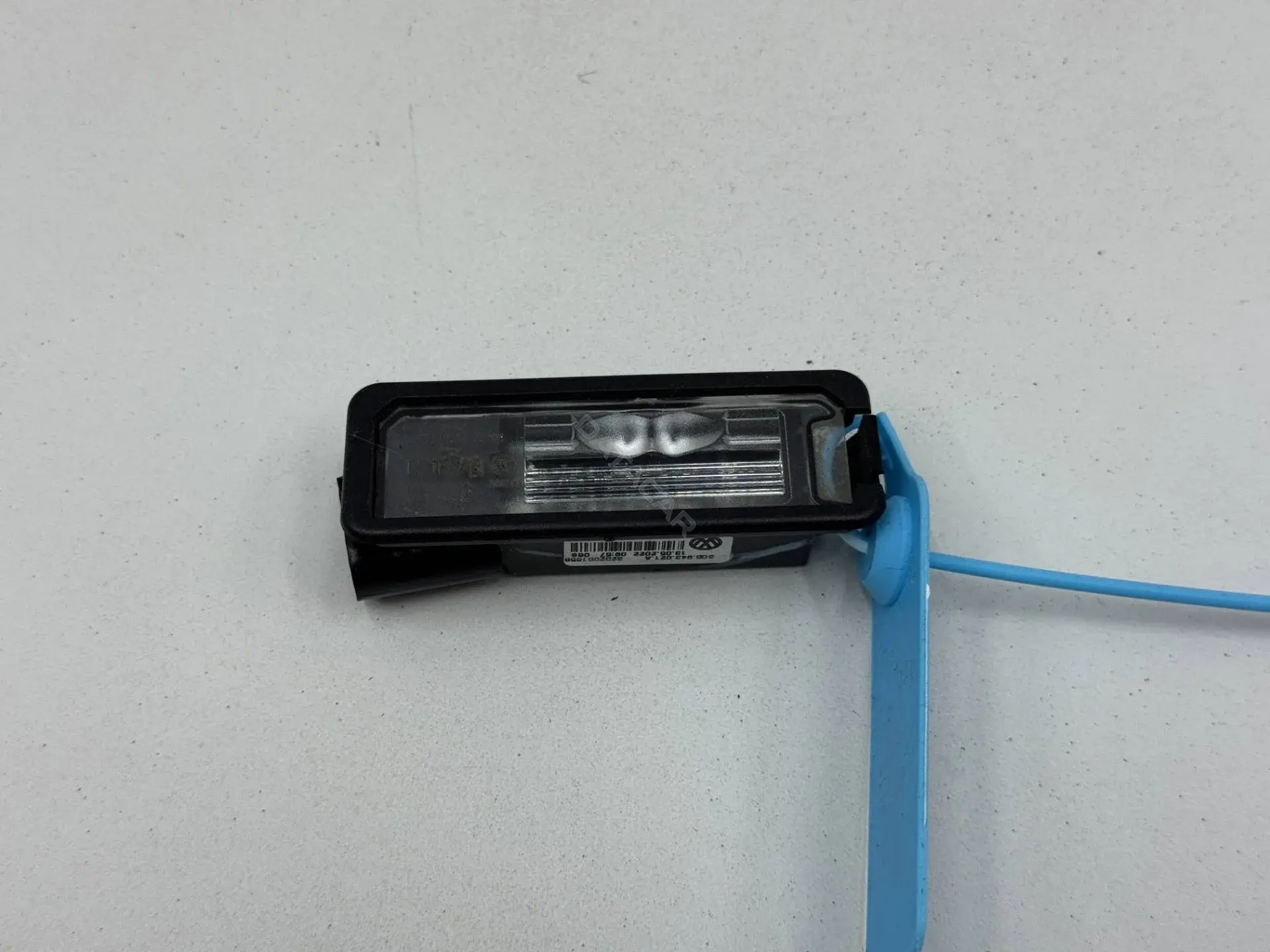 Фонарь подсветки номерного знака 3G5943021A
