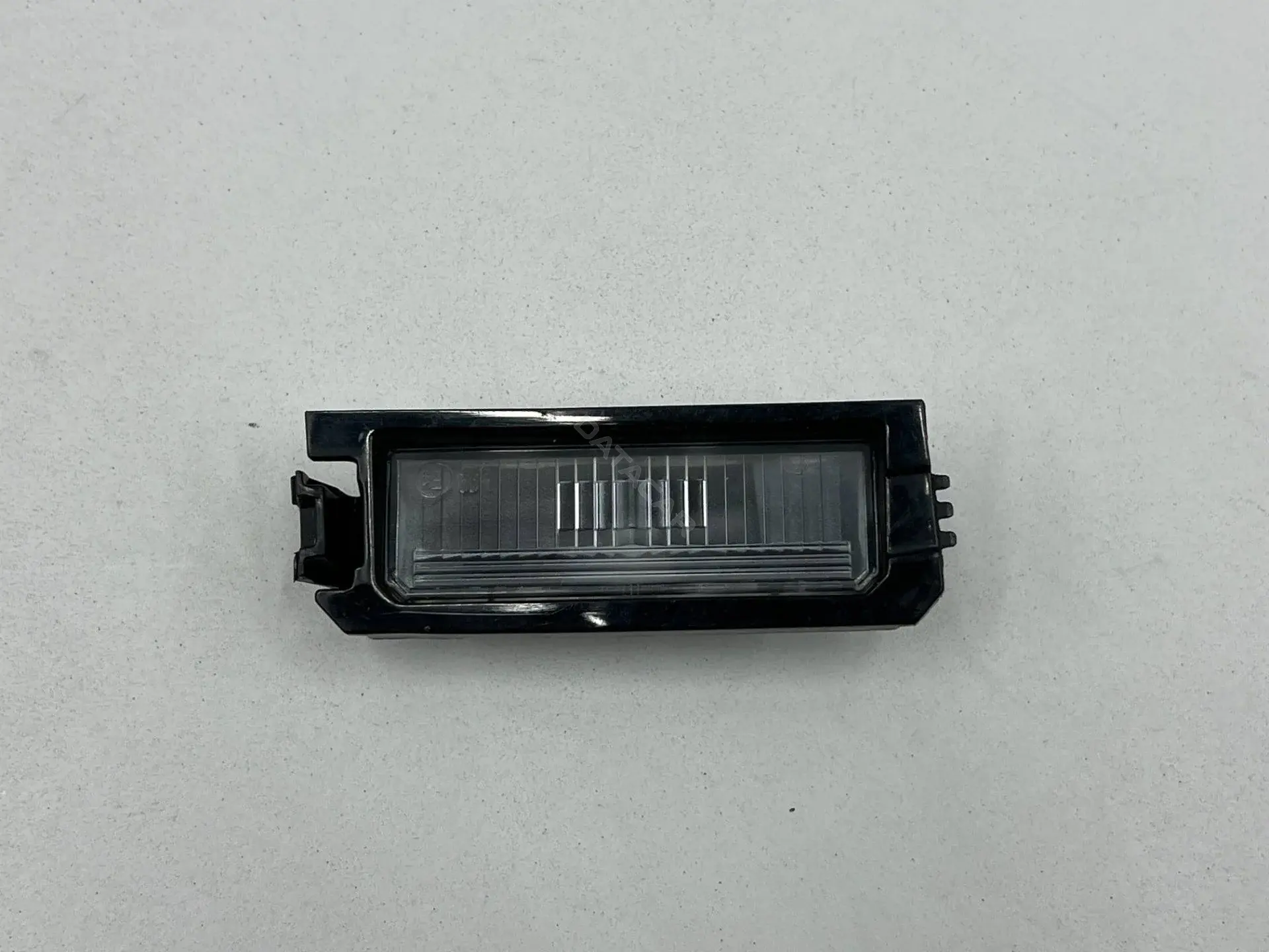 Фонарь подсветки номерного знака 92502-F6000