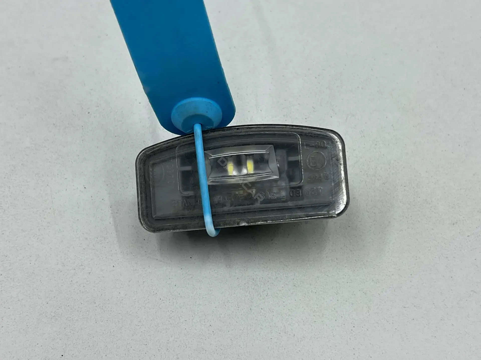 Фонарь подсветки номерного знака 34100-TZ5-A01