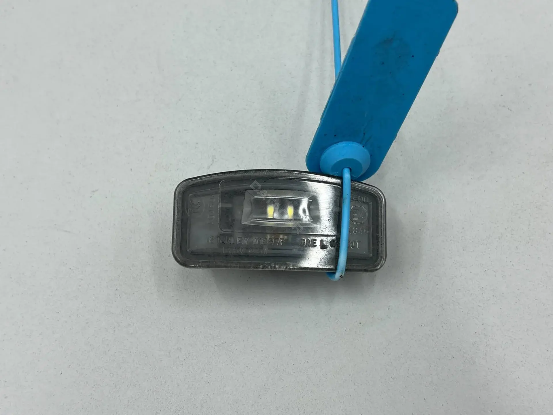 Фонарь подсветки номерного знака 34100-TZ5-A01