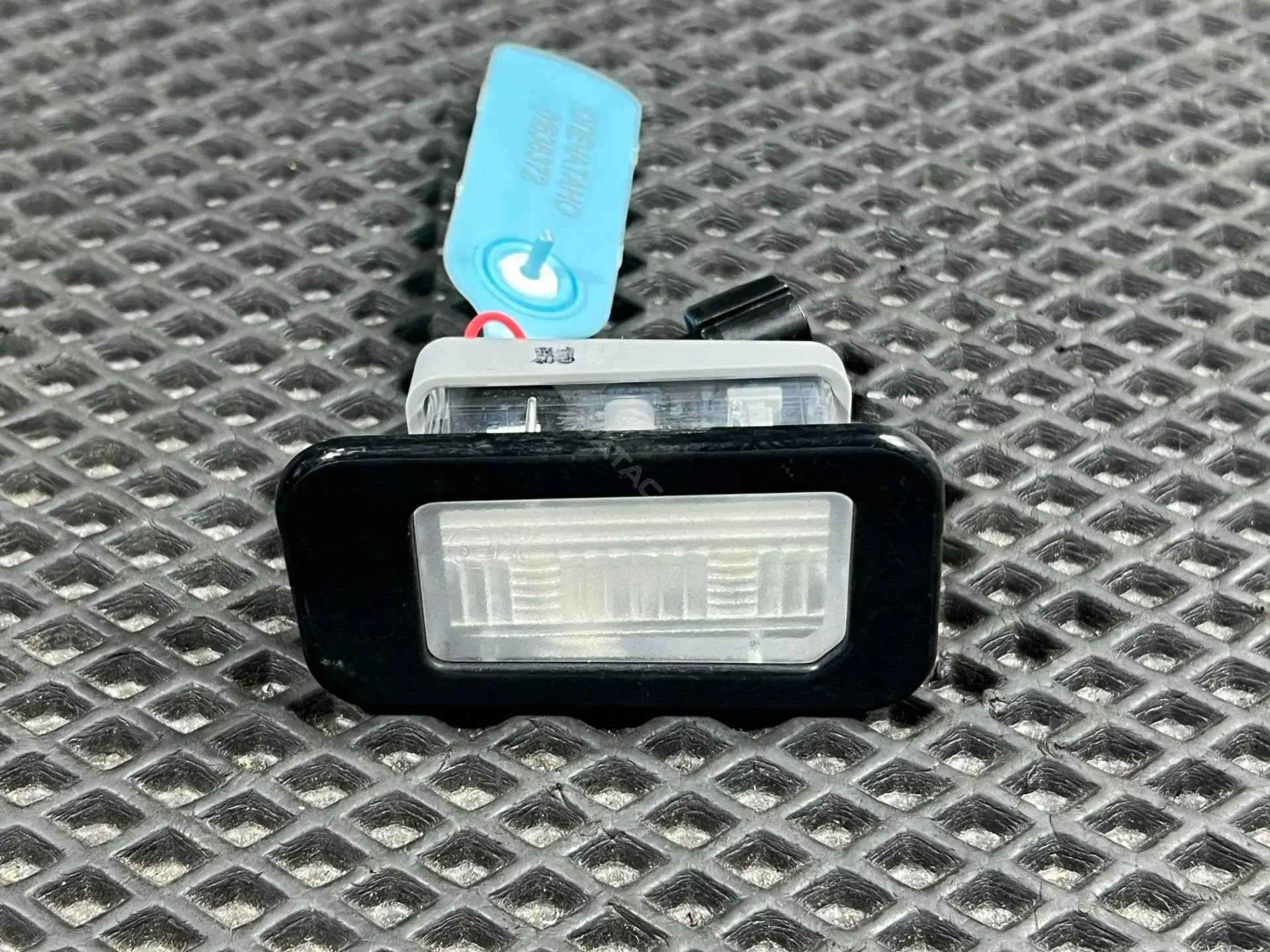 Фонарь подсветки номерного знака 92502-G9000