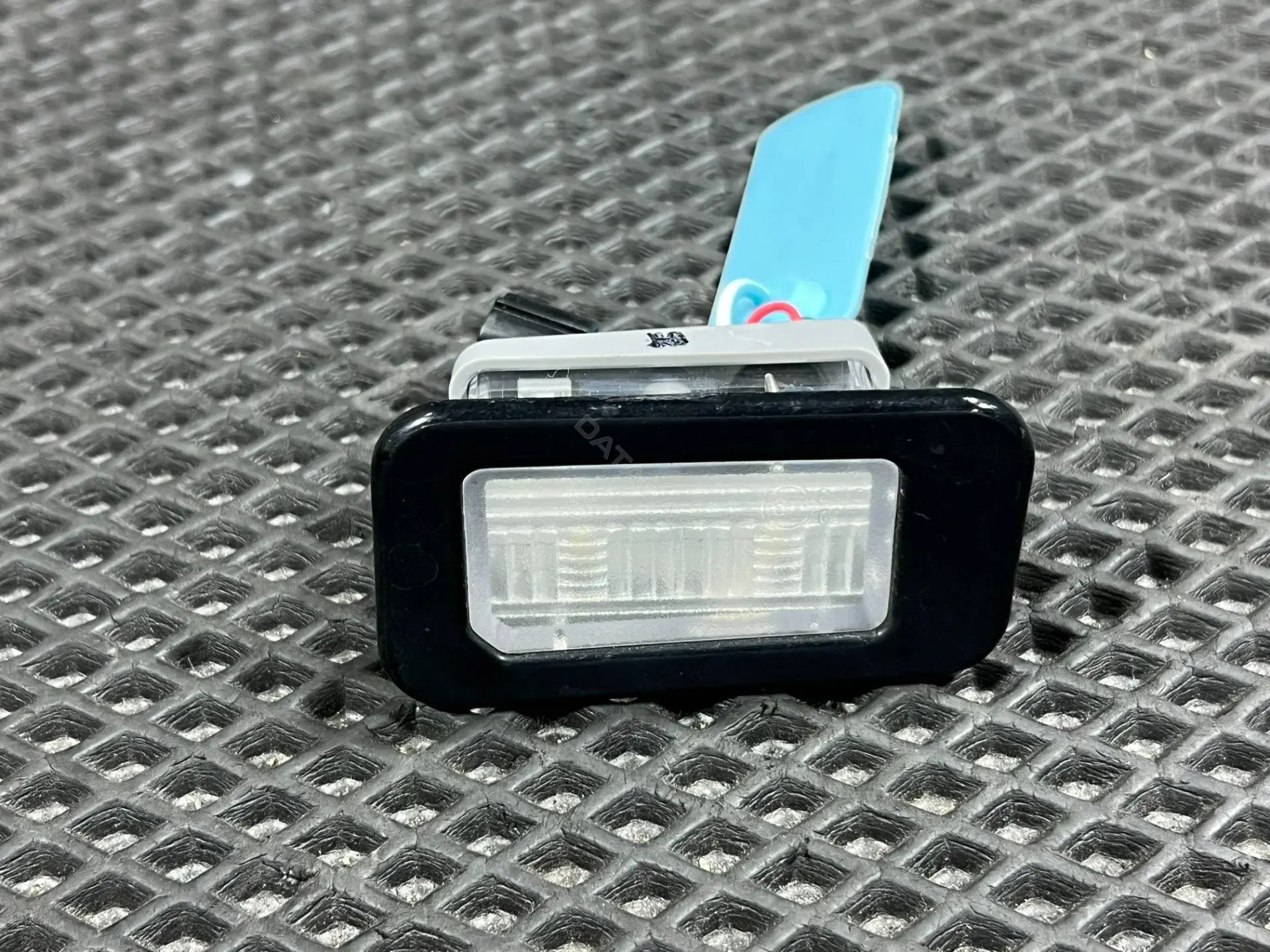 Фонарь подсветки номерного знака 92501-G9000