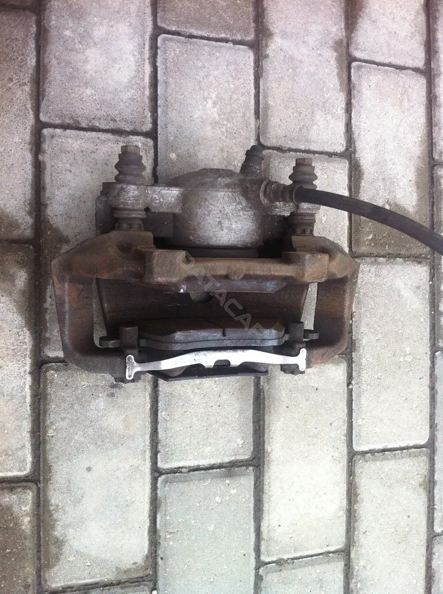 Суппорт тормозной A0009934607, A0014212586, A0014213586